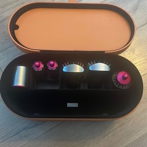 Dyson air wrap case and accessories. New..never used.